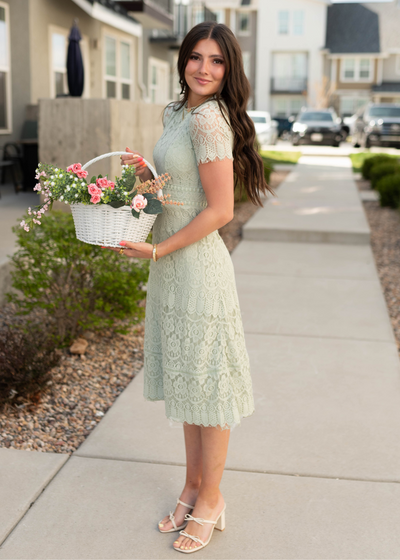 Side view of the light sage lace dress
