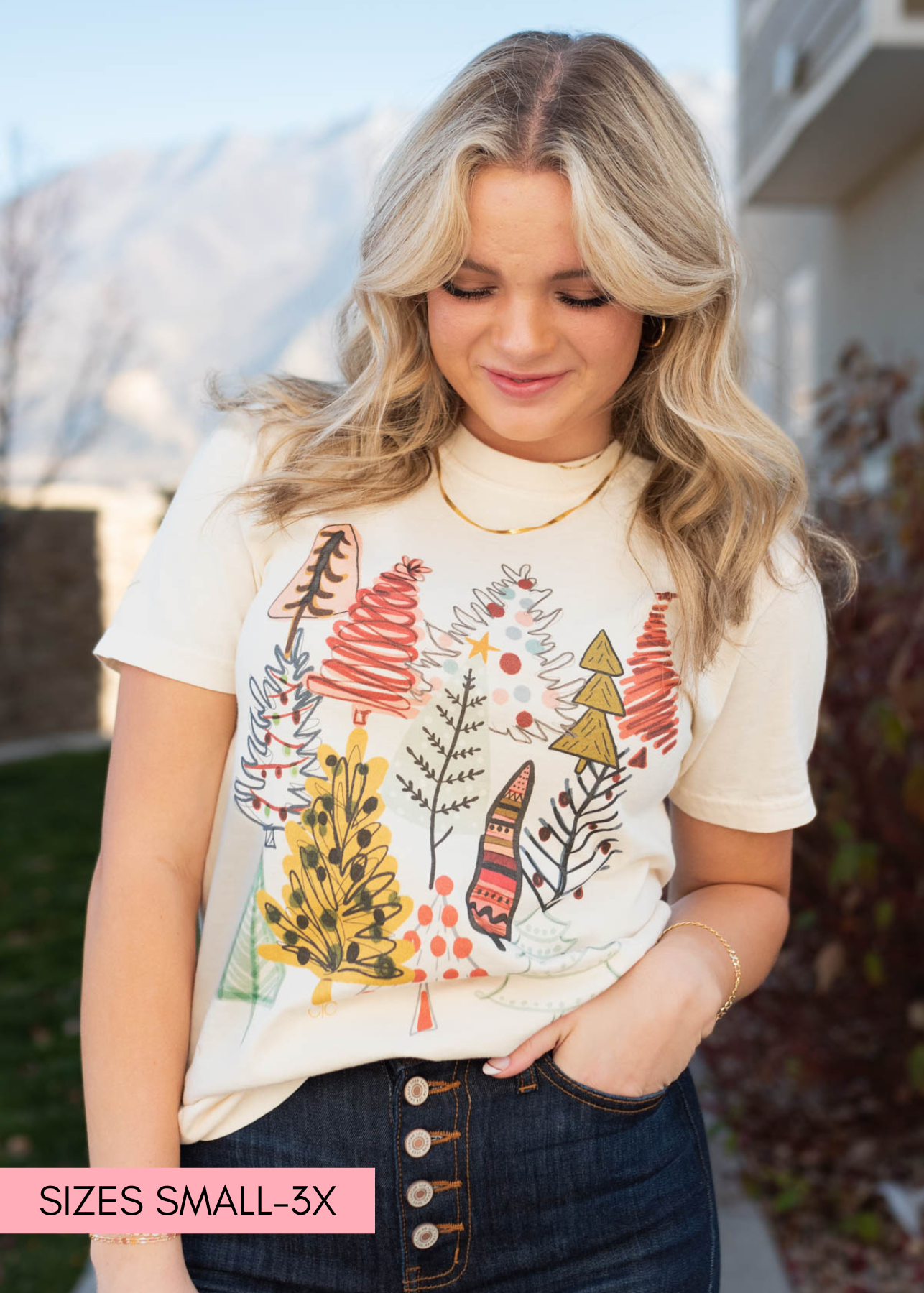 Multi color Christmas trees on a short sleeve Christmas tree shirt