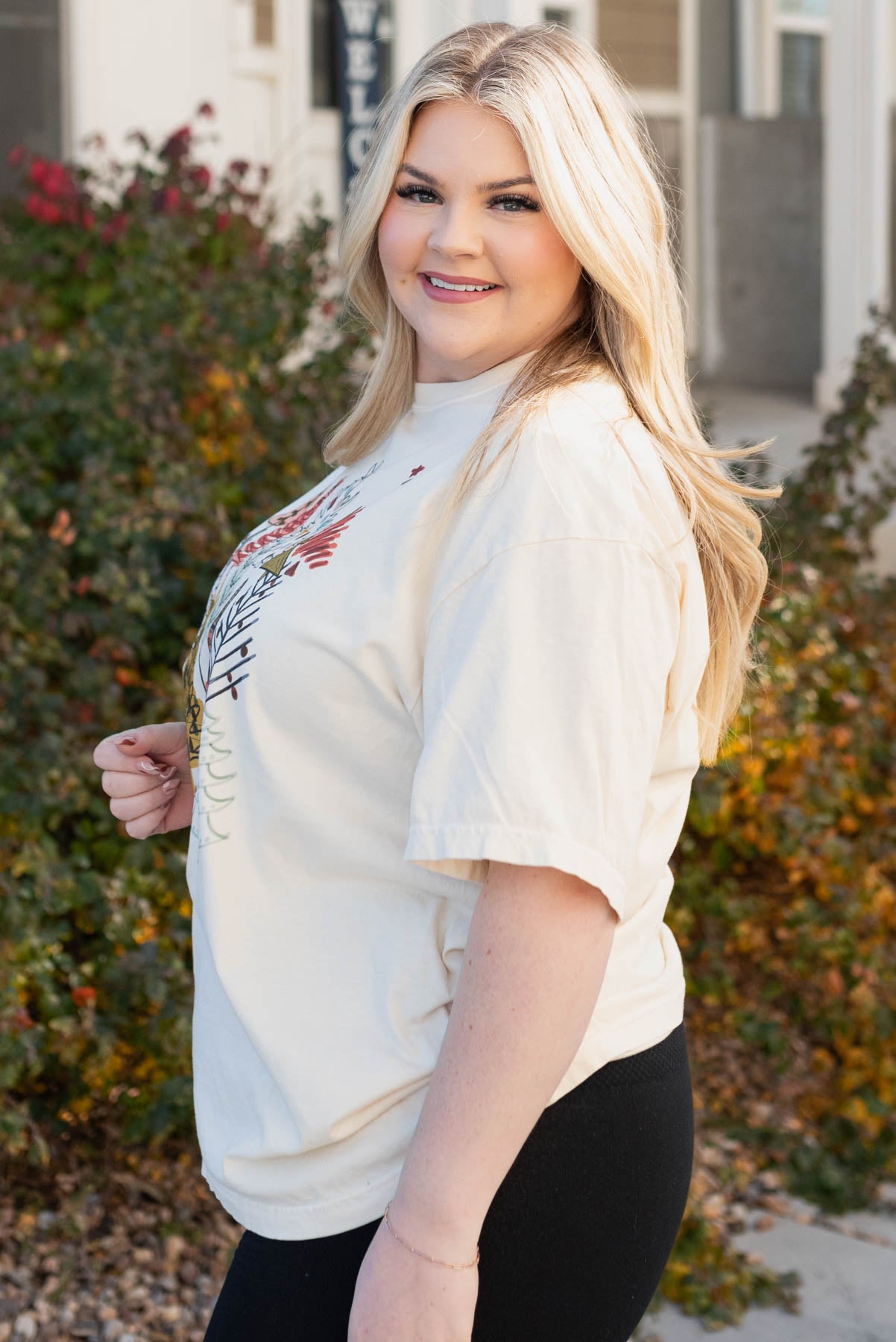 Side view of the plus size Christmas tee shirt