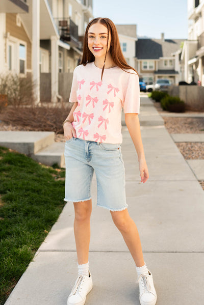 Light pink ribbons graphic tee with a crew neck