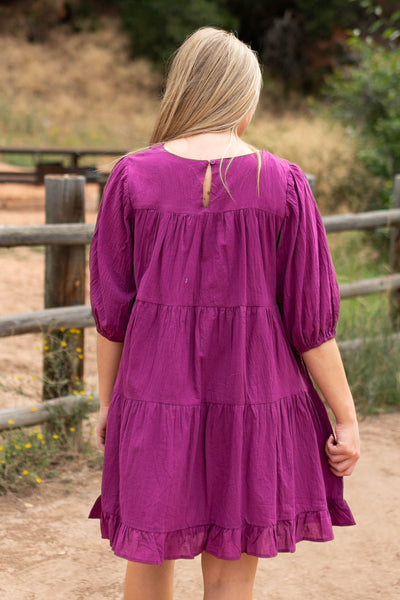 Back view of a berry dress