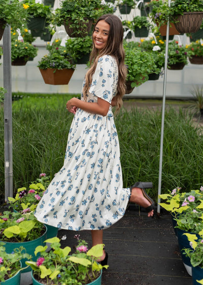 Short sleeve blue flroal dress with smocked bodice