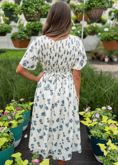 Back view of the blue floral dress