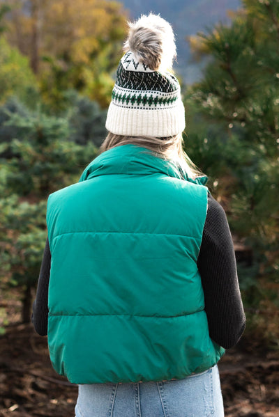 Back view of the green reversible puff vest