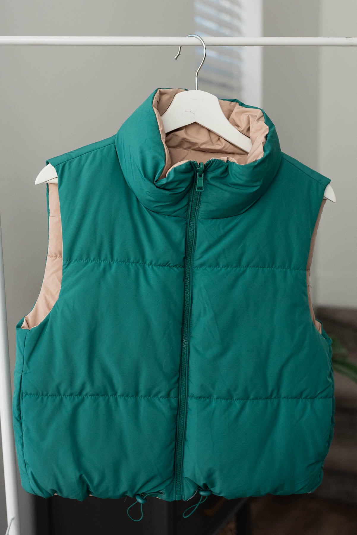 Green reversible puff vest