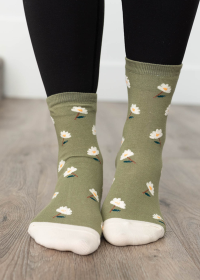 Front view of the olive daisy garden socks