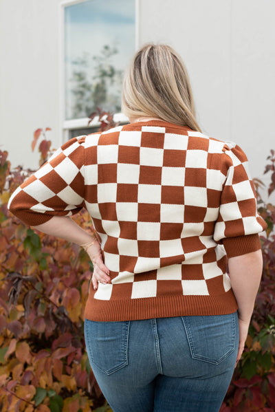 Back view of the plus size camel sweater