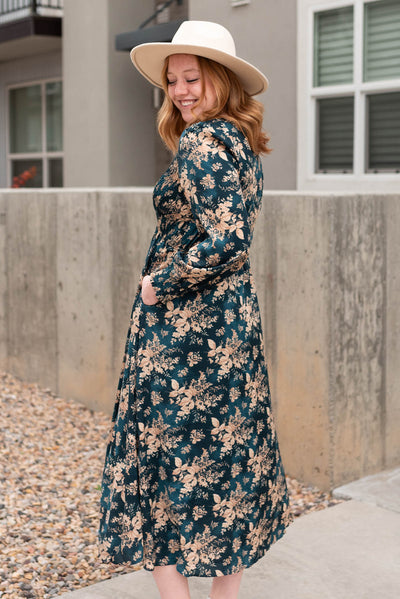 Side view of the teal satin floral dress