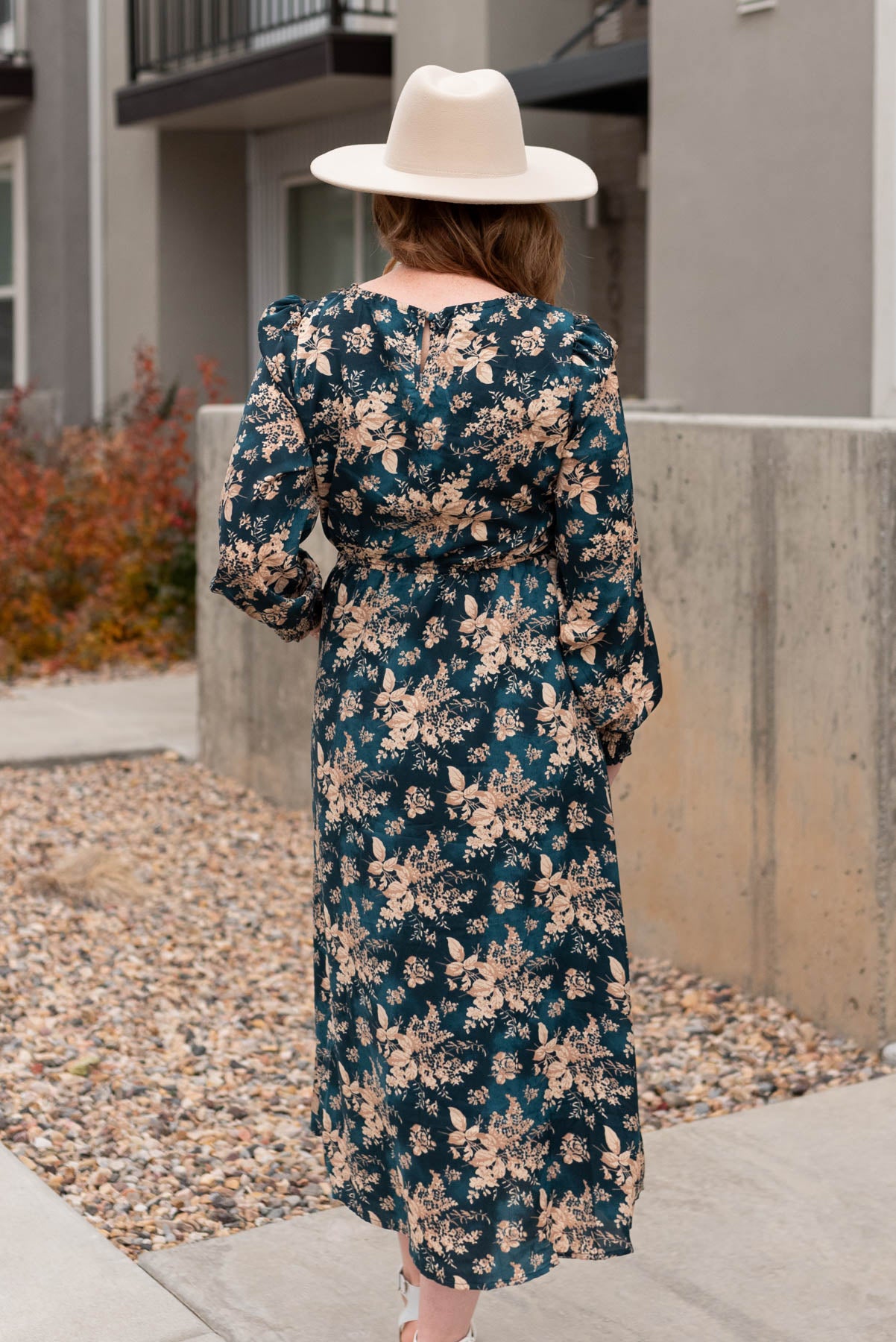 Back view of the teal satin floral dress