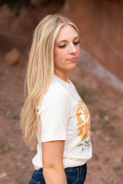 Side view of a feeling thankful ivory tee