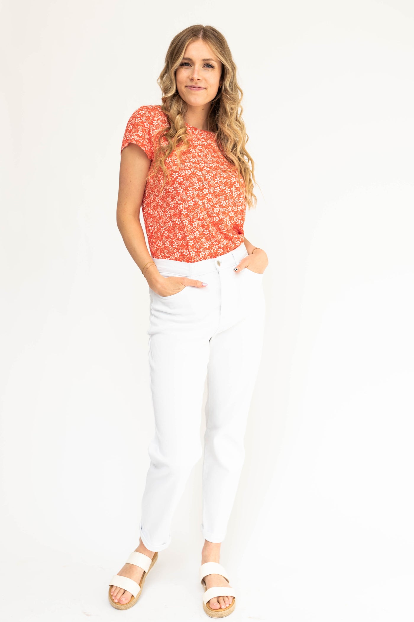 Short sleeve coral red top with white flowers