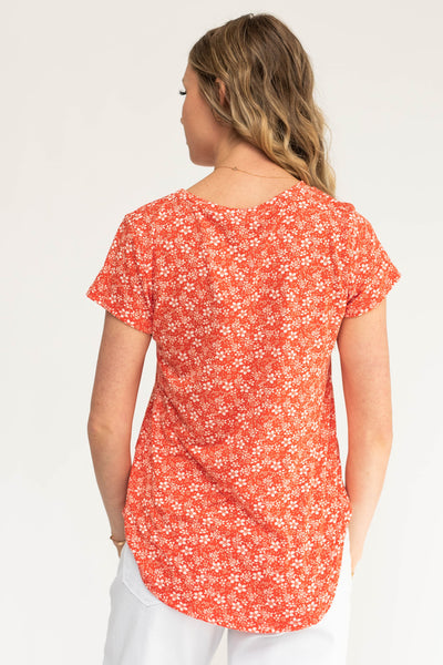 Back view of a floral red top