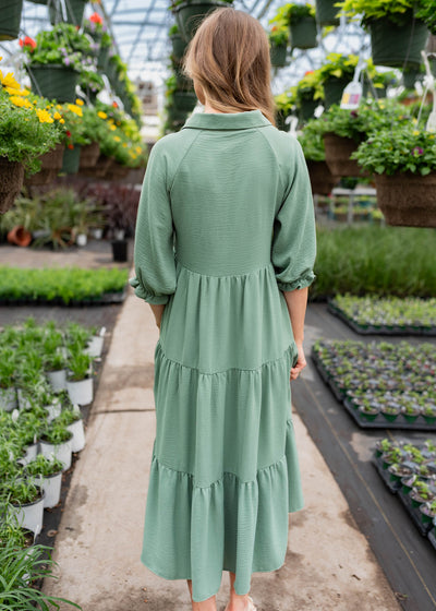 Back view of the green collared tiered dress
