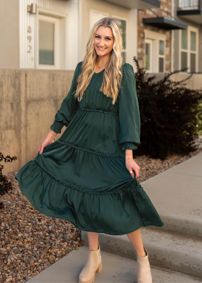 Long sleeve hunter green dress with elastic waist and tiered skirt