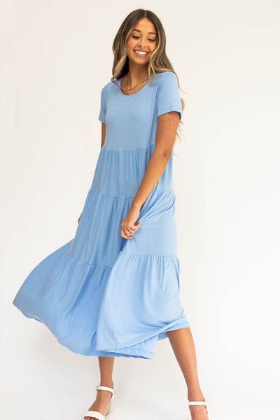 Blue spring dress with tiered skirt and short sleeves
