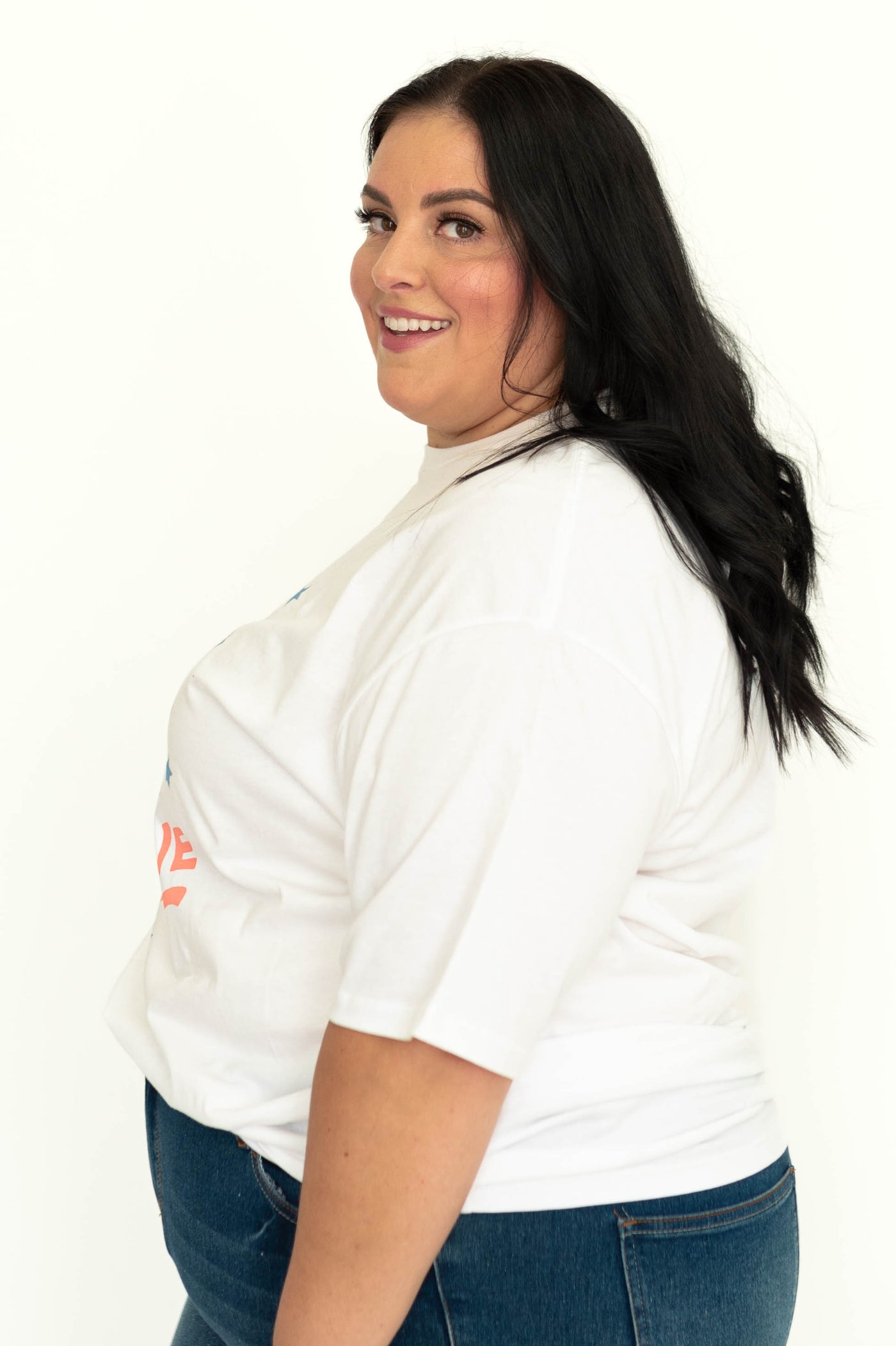 Side view of plus size back view of brave white tee