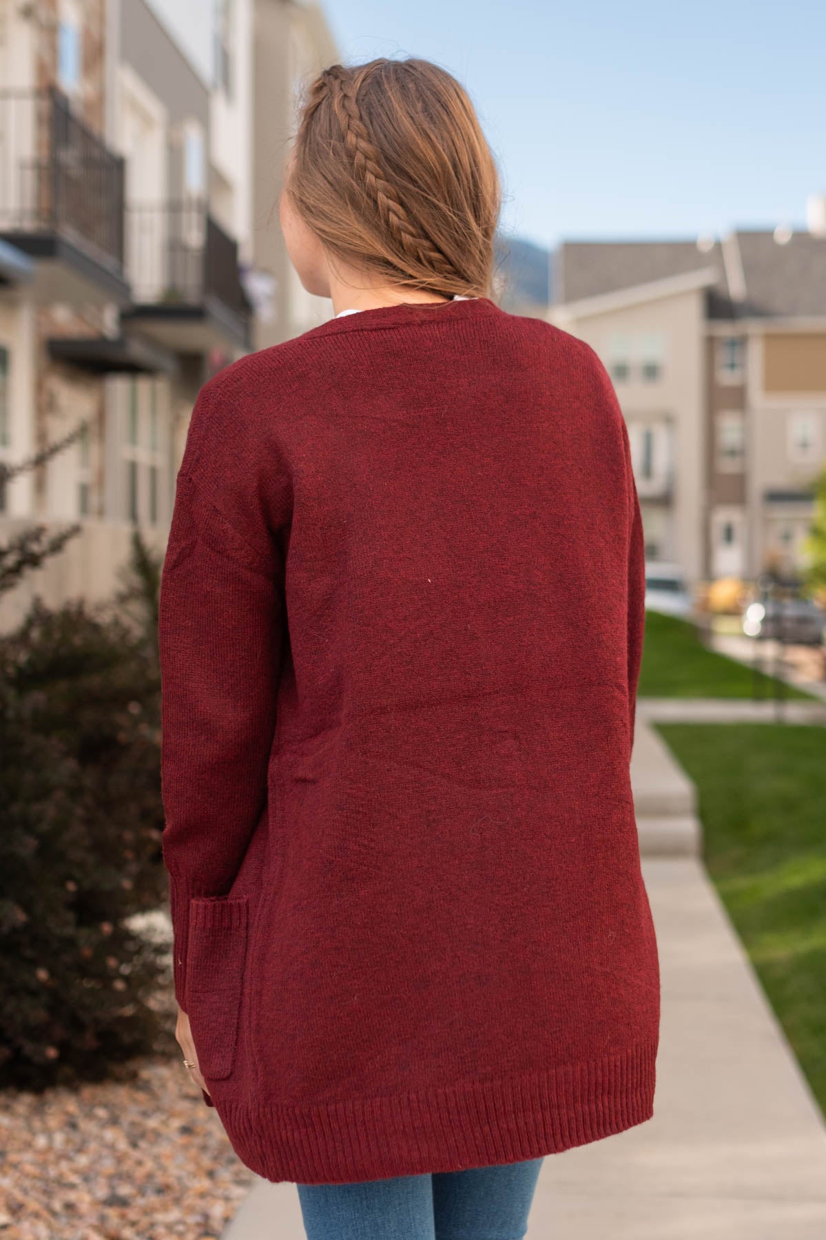Back view of a burgundy cardigan