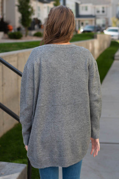 Back view of a grey cardigan