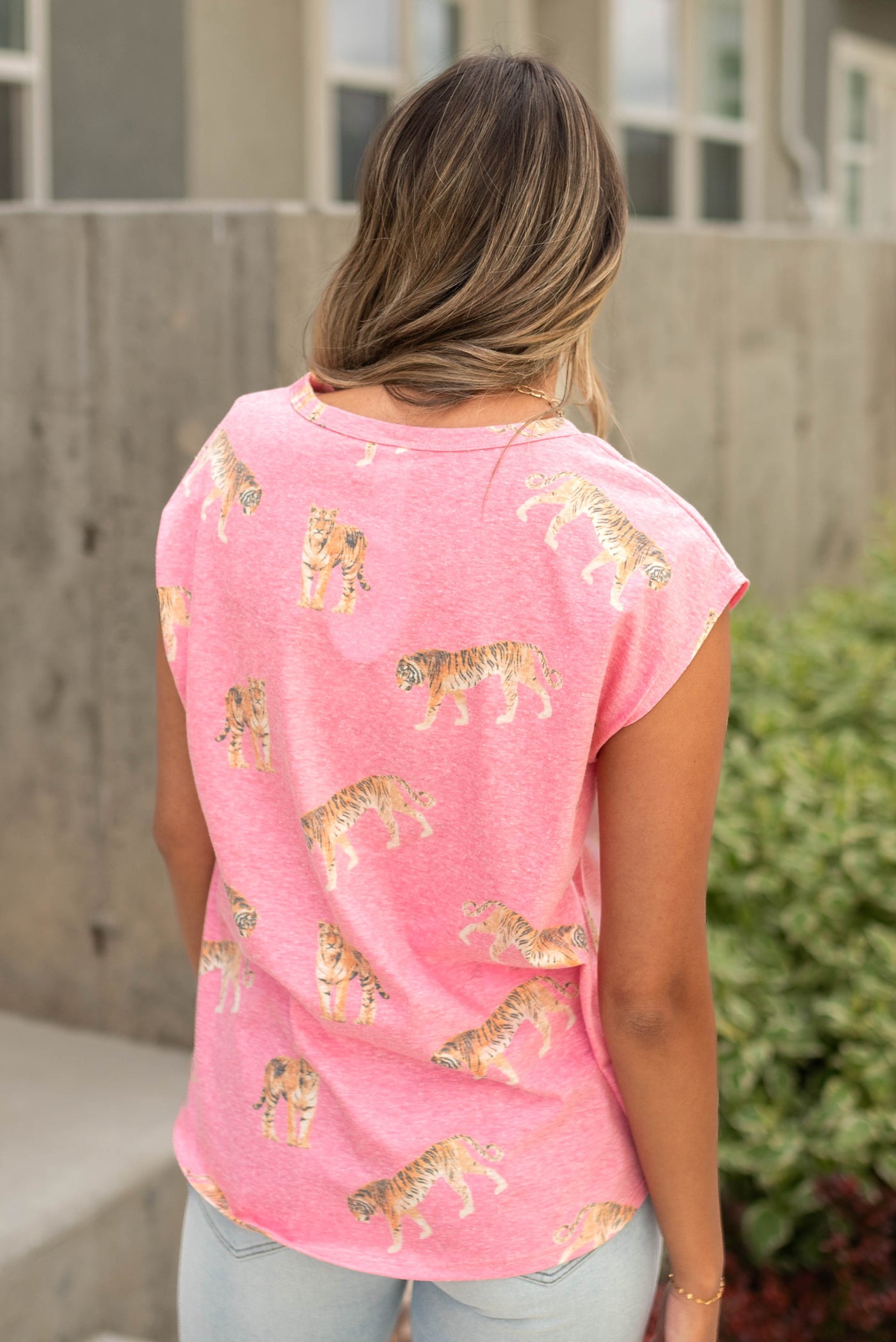 Back view of a fuchsia vintage top