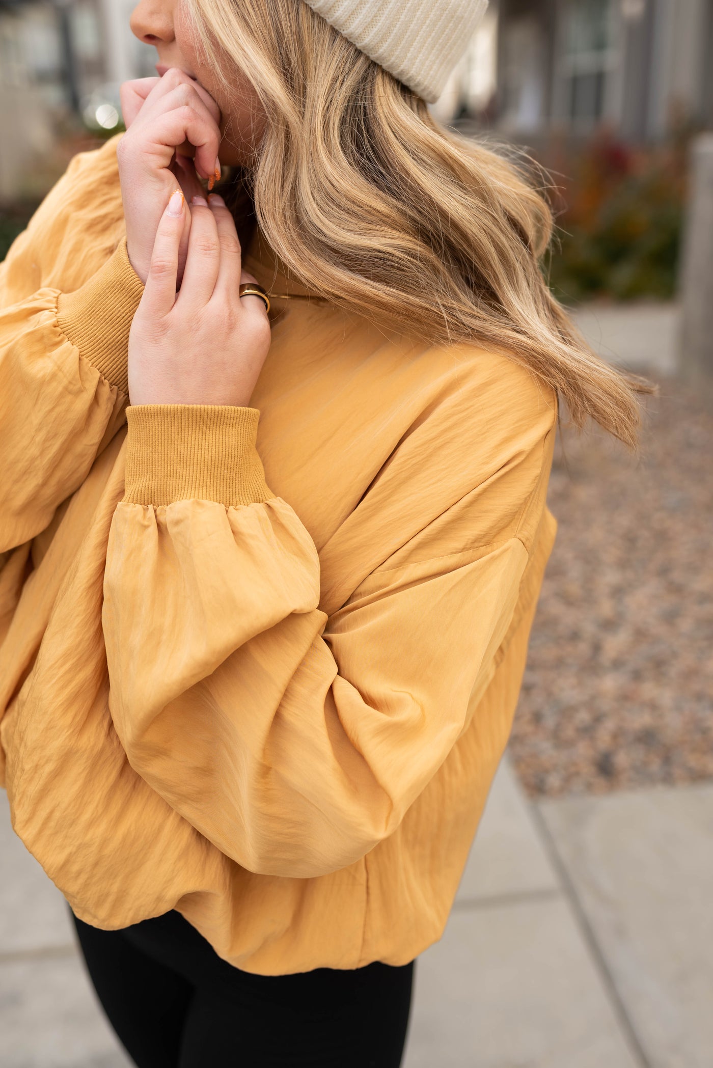 Side view of the mustard parachute blouse
