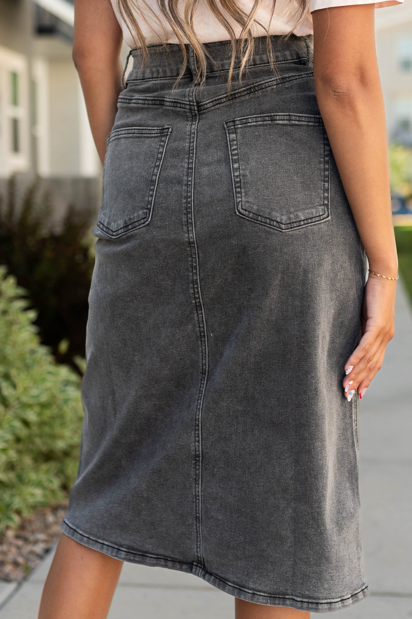 Back of a black skirt with pockets