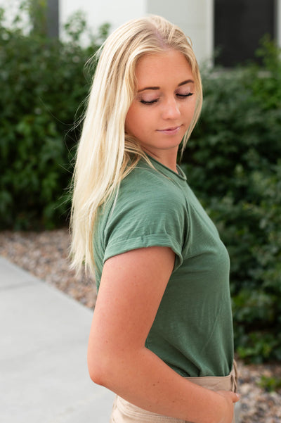 Side view of a deep green top