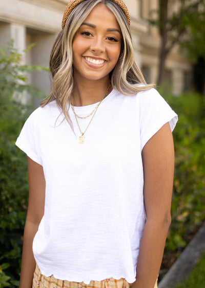 White tee with surged edge