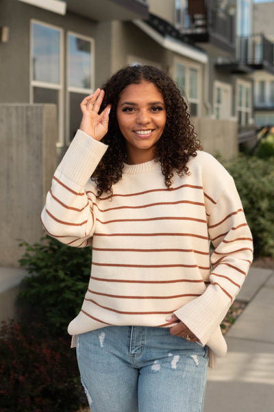 Long sleeve ivory sweater with slits on the side