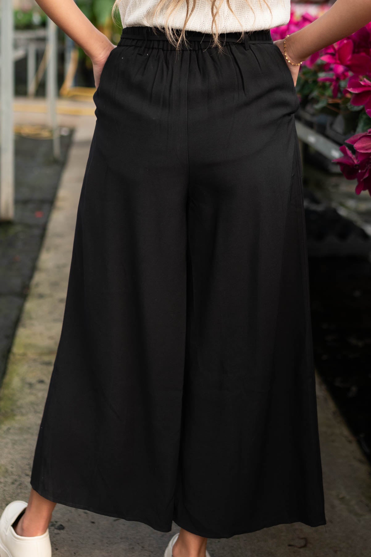 Back view of the black wide leg pants