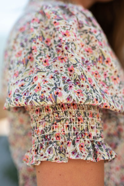 Sleeve of a pink floral top