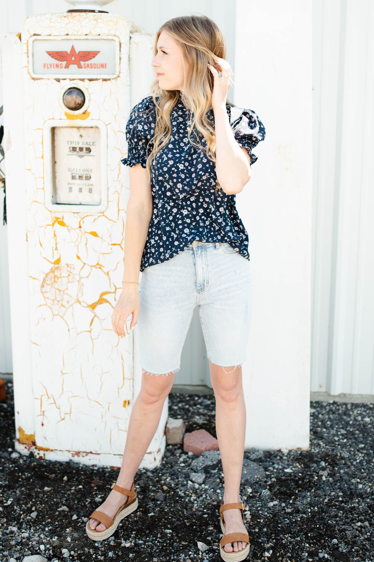 Navy floral top with short full sleeves