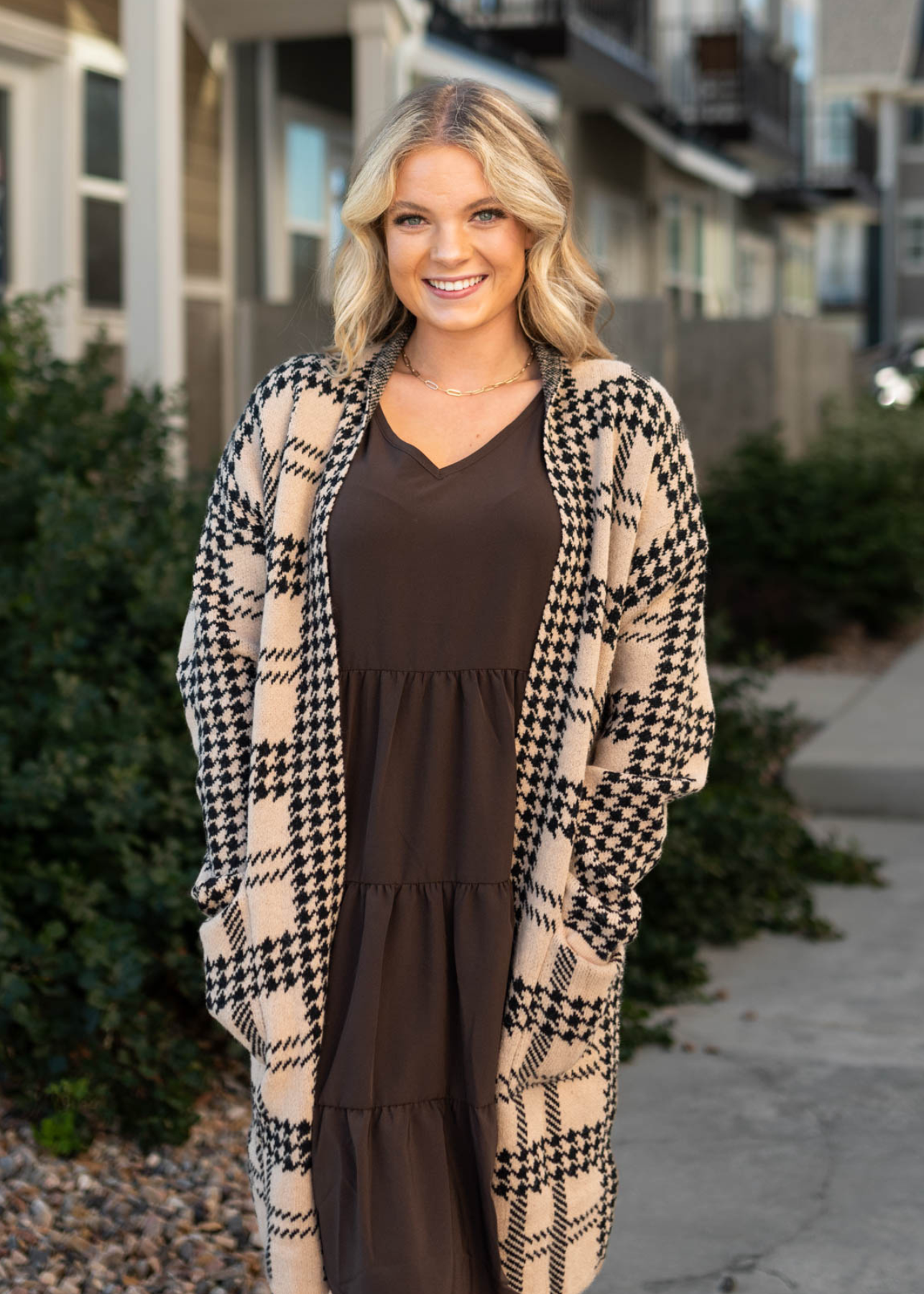 Taupe cardigan with black pattern and pockets