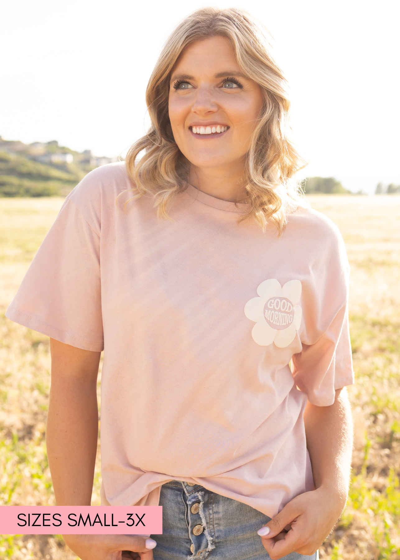 Short sleeve pink top with white daisy