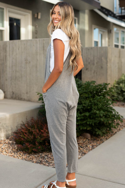 Side view of a knit charcoal jumpsuit