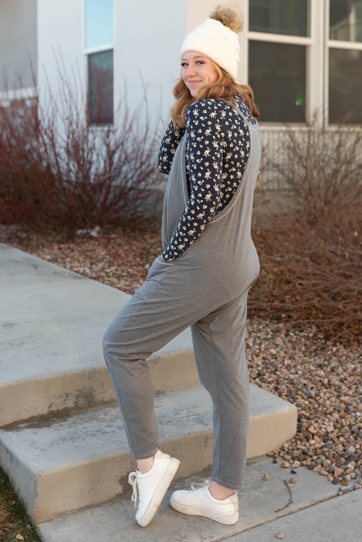 Side view of the charcoal jumpsuit