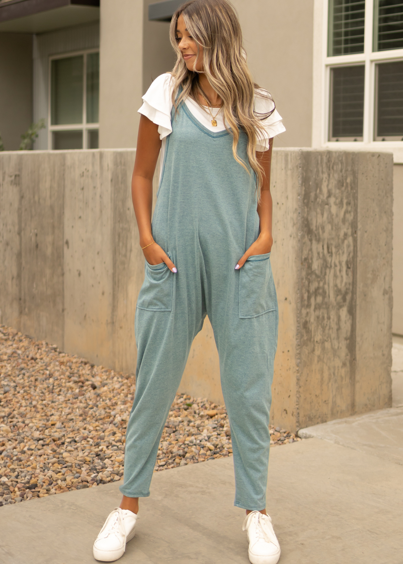 Dusty teal jumpsuit with a v-neck