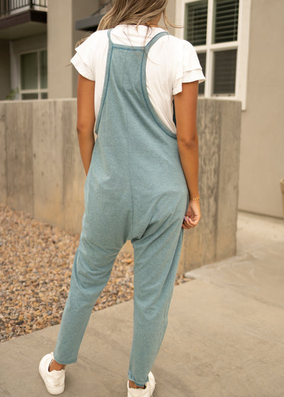 Back view of a dusty teal jumpsuit