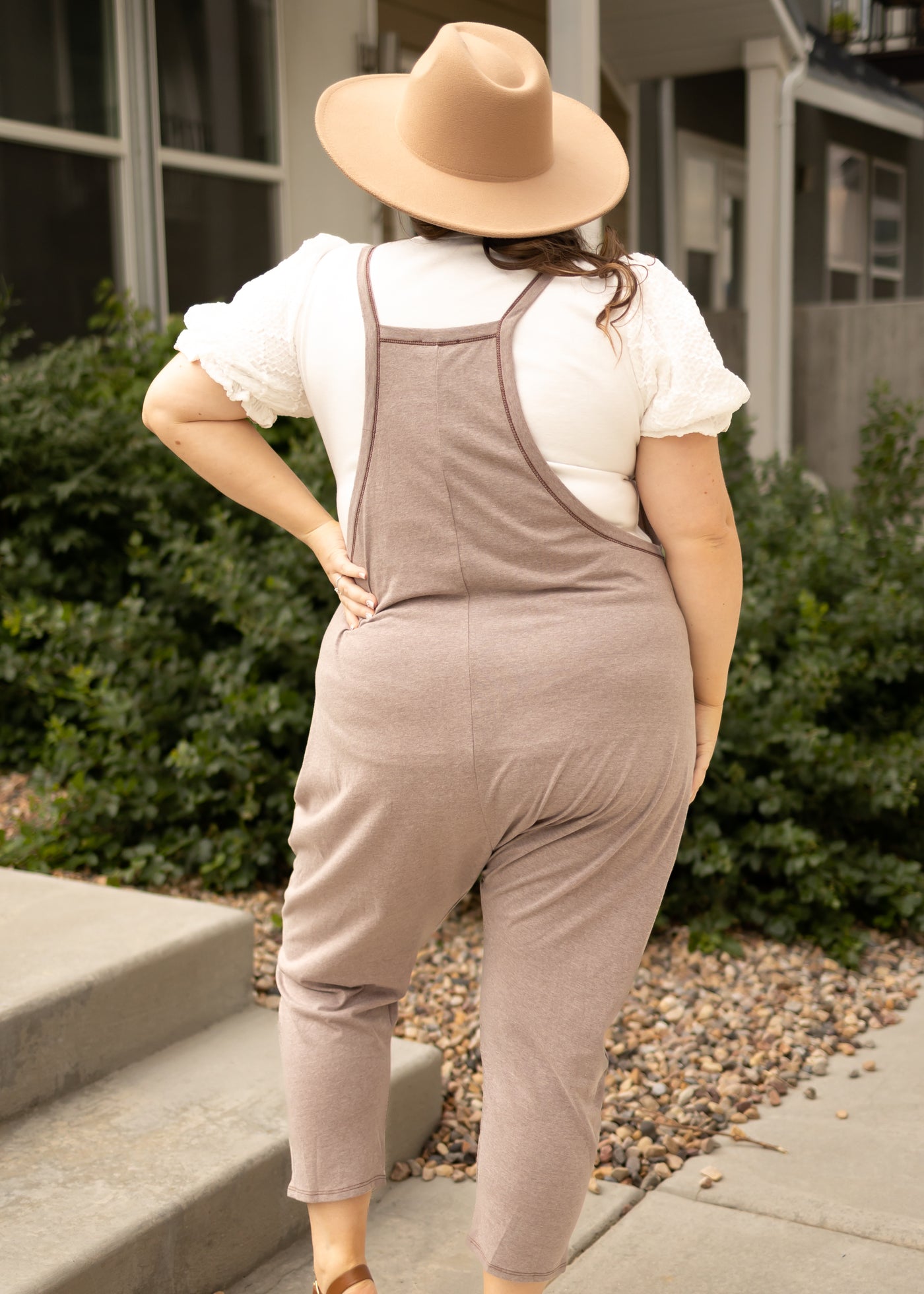 Back view of a plus size stone jumpsuit