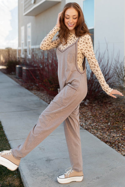 Side view of a stone jumpsuit