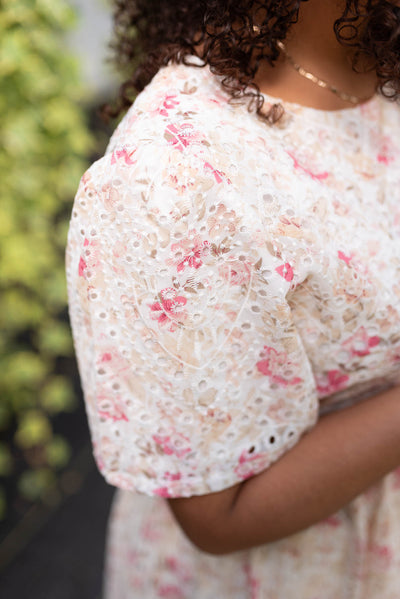 Close up of the sleeve and fabric on the rose floral dress
