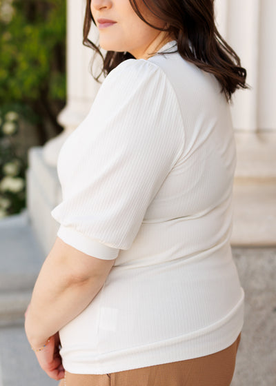 Side view of the plus size basic white top