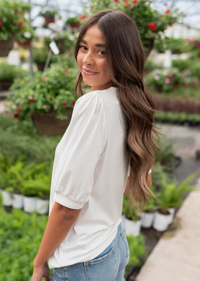 Side view of the basic white top