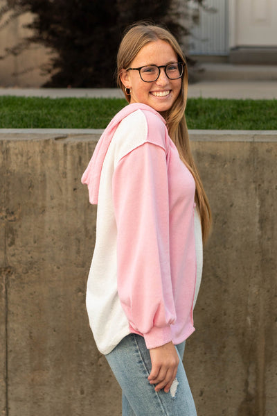 Side view of a pink hoodie