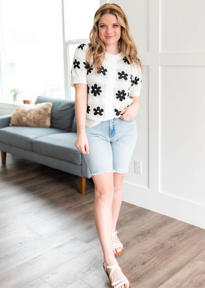 Ivory floral short sleeve sweater with black flowers