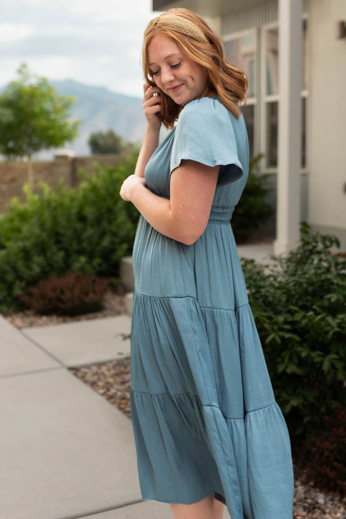 Side view of a light teal dress