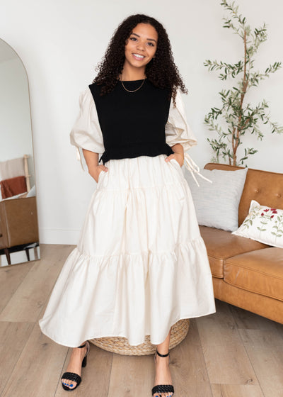 Front view of the black sweater vest dress