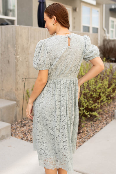 Back view of the sage blue lace dress