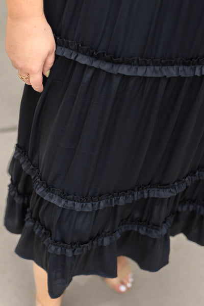 Plus size deep navy dress with ruffles on skirt