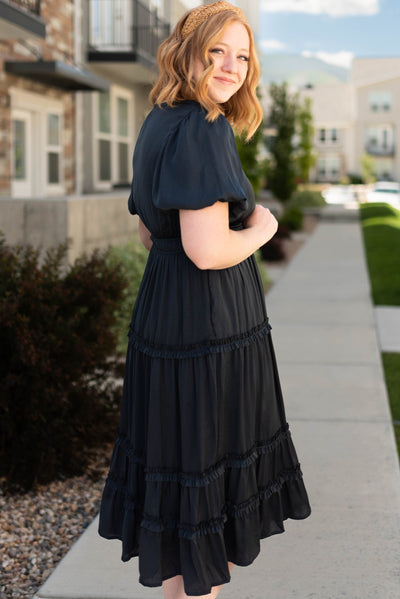 Side view of a deep navy dress