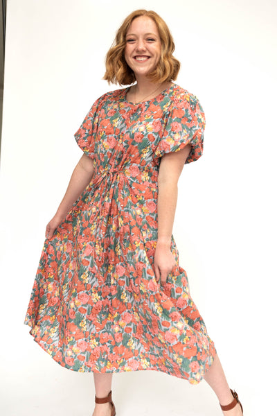 Medium short sleeve coral floral dress with full skirt